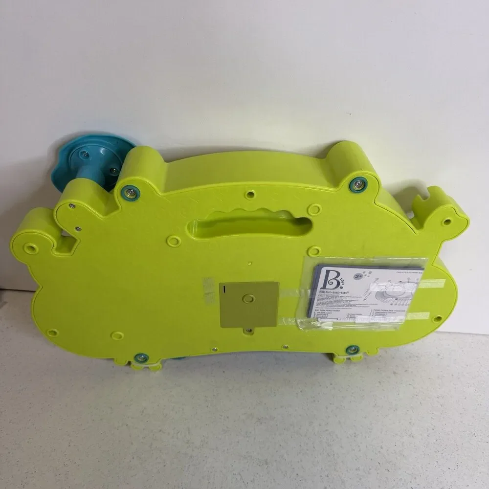B. Toys Ribbit Tat Tat Interactive Music Lights Frog Drum